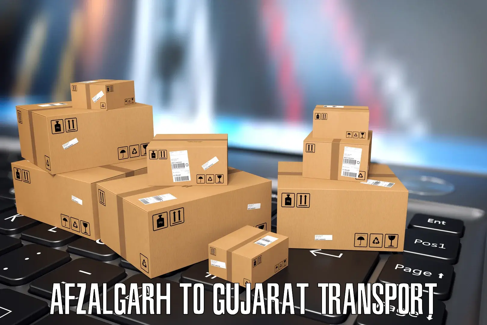 Nearest transport service Afzalgarh to Surat