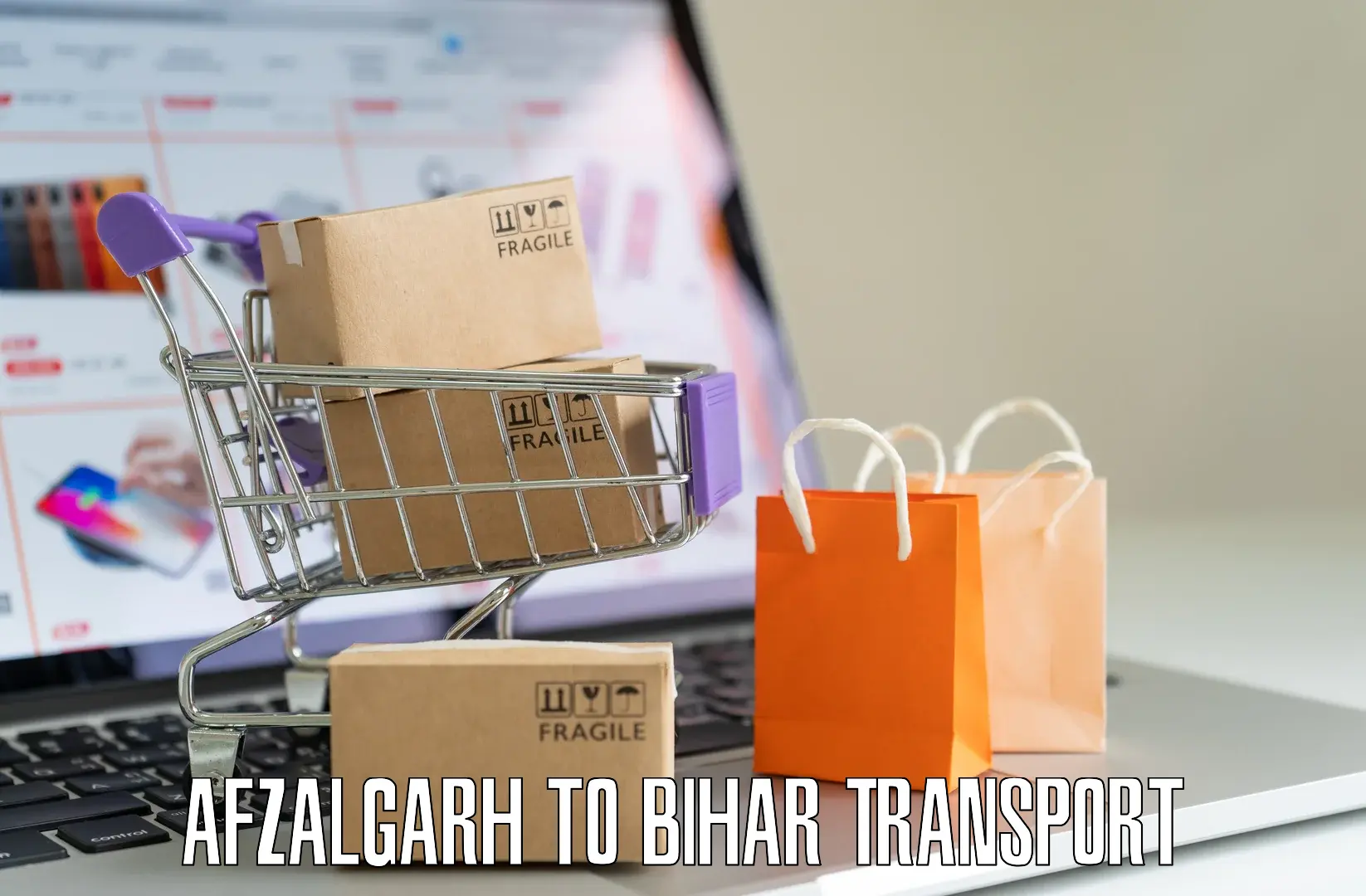 Vehicle parcel service Afzalgarh to Manjhaul